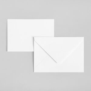 White envelopes displayed in multiple sizes, ideal for business stationery, invitations, and professional mailing.